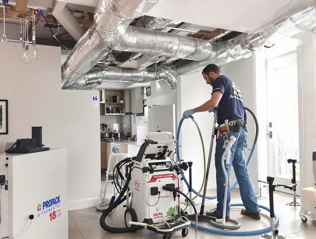 Norfolk Air Duct Cleaning technician performing advanced pure duct cleaning with specialized equipment in Norfolk